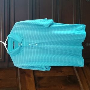 Greg Norman golf shirt, light blue, size L